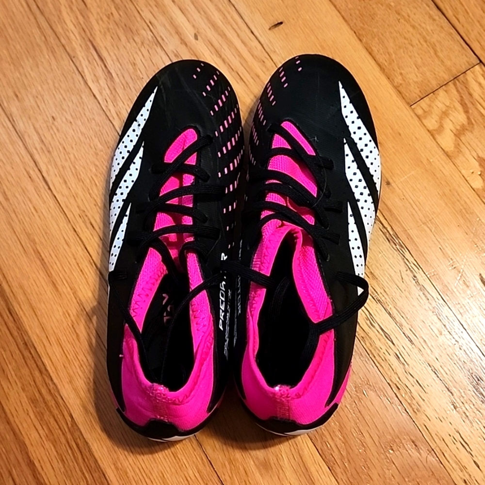 Adidas pink and black soccer cleats